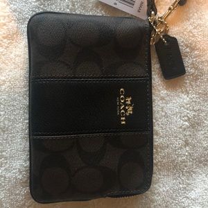 Coach brown/black wristlet 6”w x 4”h